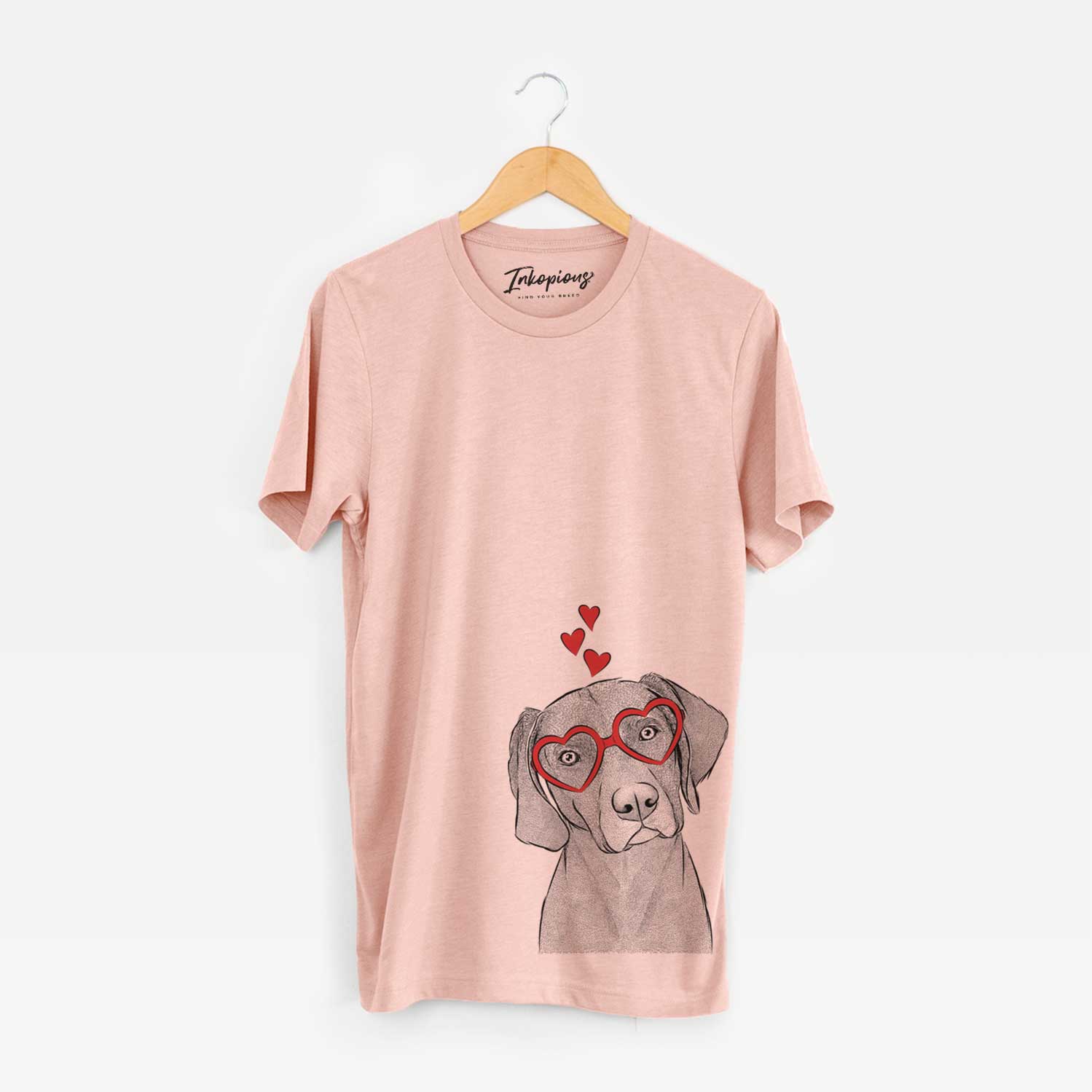 Hand-drawn sketch of Willow the Weizsla wearing heart-shaped glasses on a Peach Unisex crewneck