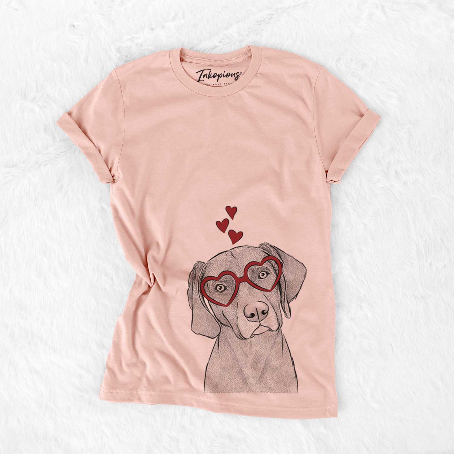 Hand-drawn sketch of Willow the Weizsla wearing heart-shaped glasses on a Peach Bella Canvas Unisex Crewneck