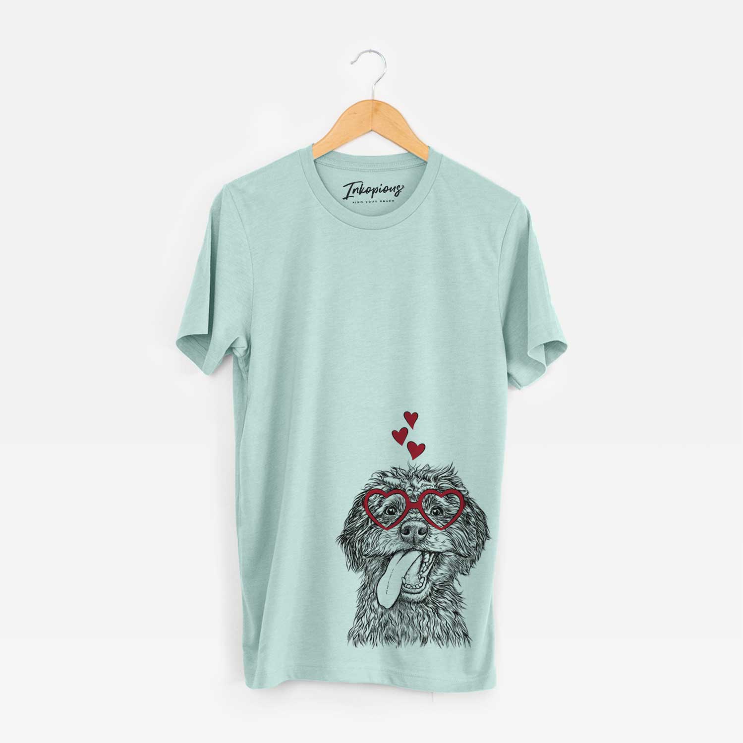 Hand-drawn sketch of Winnie the Mini Aussiedoodle wearing heart-shaped glasses on a Heather Sage Bella Canvas Unisex Crewneck