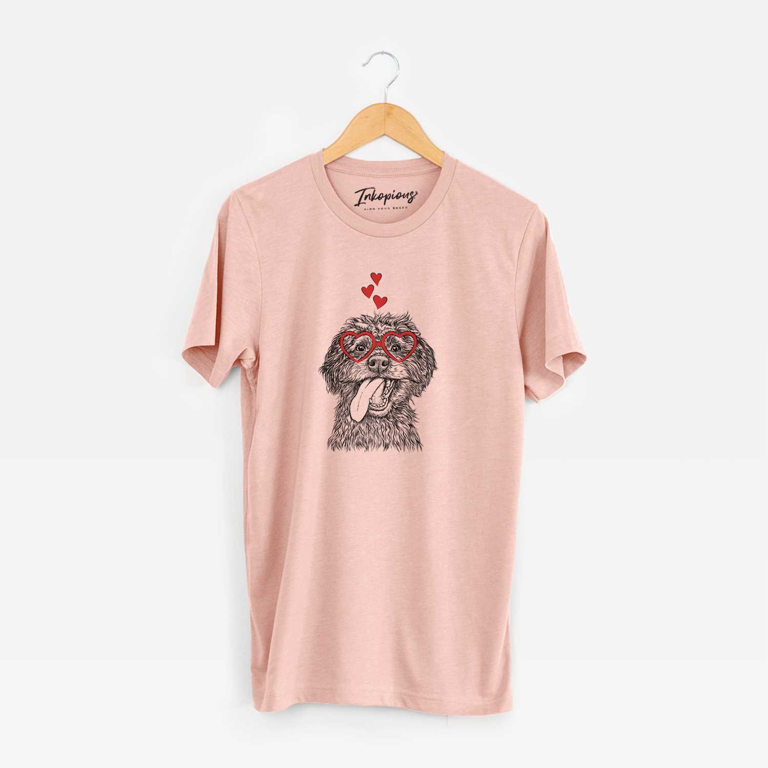 Hand-drawn sketch of Winnie the Mini Aussiedoodle wearing heart-shaped glasses on a Peach Unisex crewneck