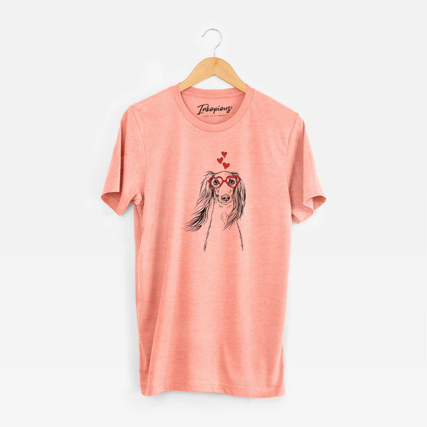 Hand-drawn sketch of Zahra the Saluki wearing heart-shaped glasses on a Sunset Unisex crewneck