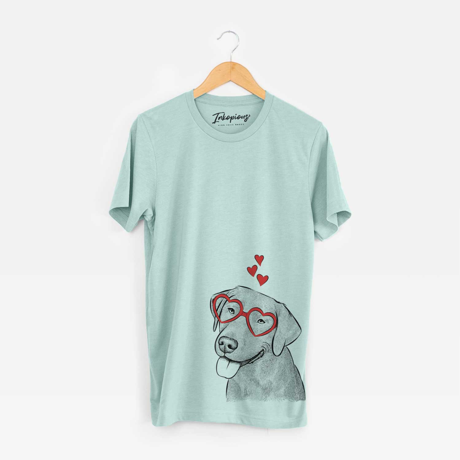 Hand-drawn sketch of Zeppelin the Black Labrador wearing heart-shaped glasses on a Heather Sage Unisex crewneck