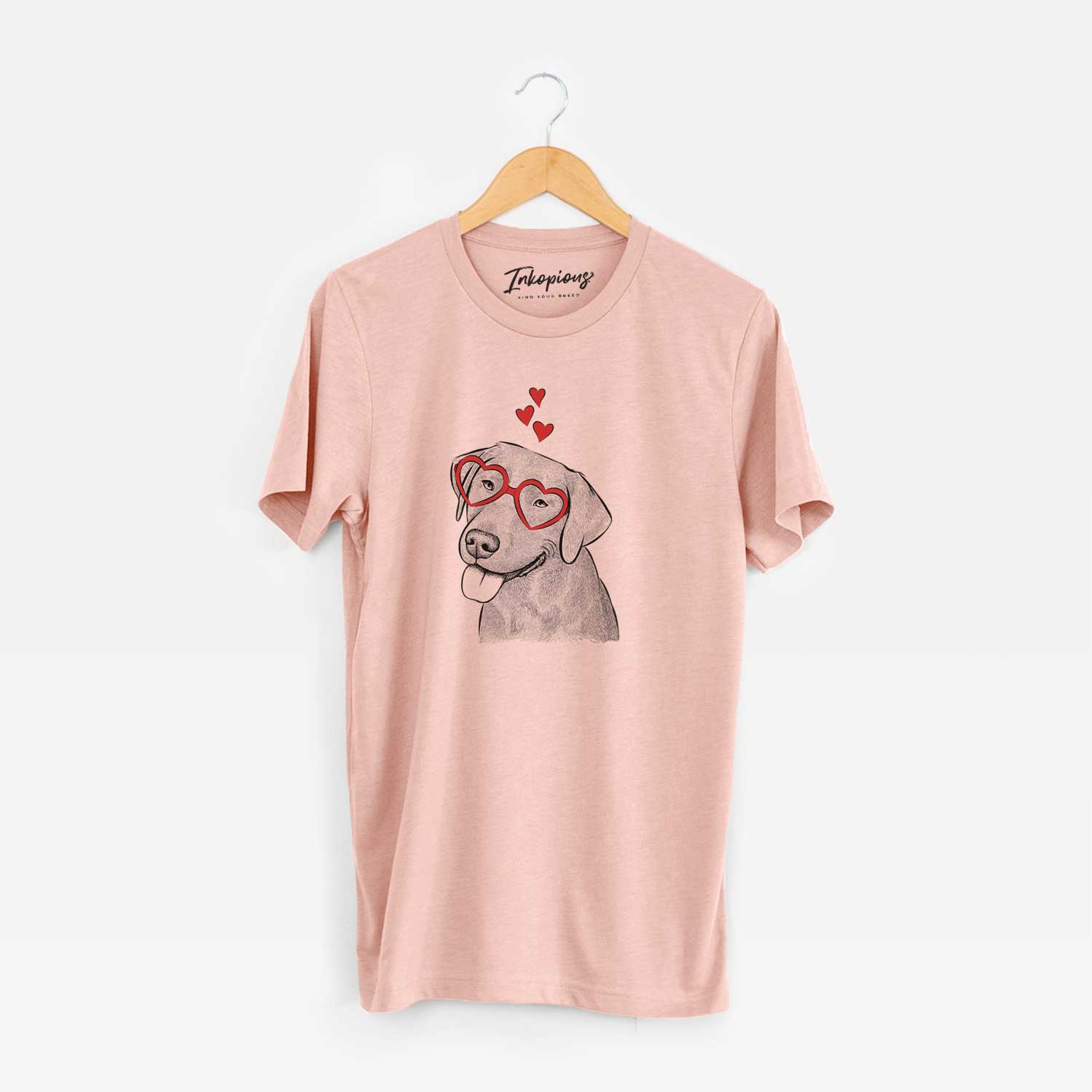 Hand-drawn sketch of Zeppelin the Black Labrador wearing heart-shaped glasses on a Peach Unisex crewneck