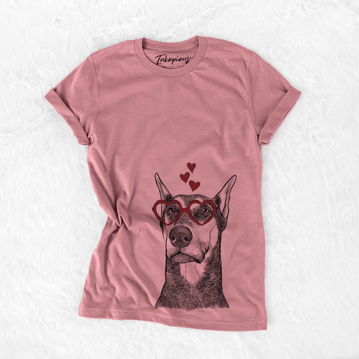 Hand-drawn sketch of Zeus the Doberman Pinscher wearing heart-shaped glasses on a Mauve Bella Canvas Unisex Crewneck