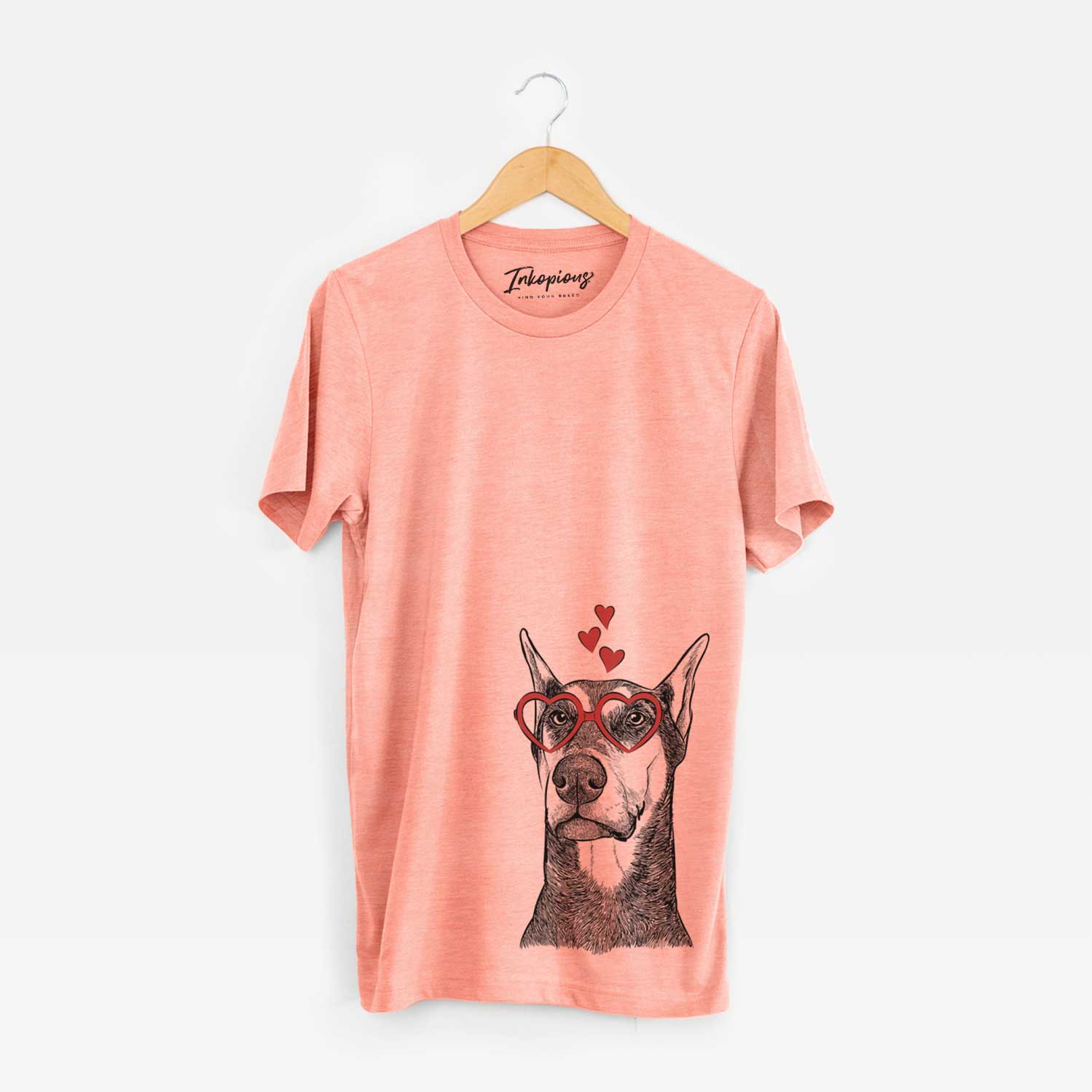 Hand-drawn sketch of Zeus the Doberman Pinscher wearing heart-shaped glasses on a Sunset Unisex crewneck