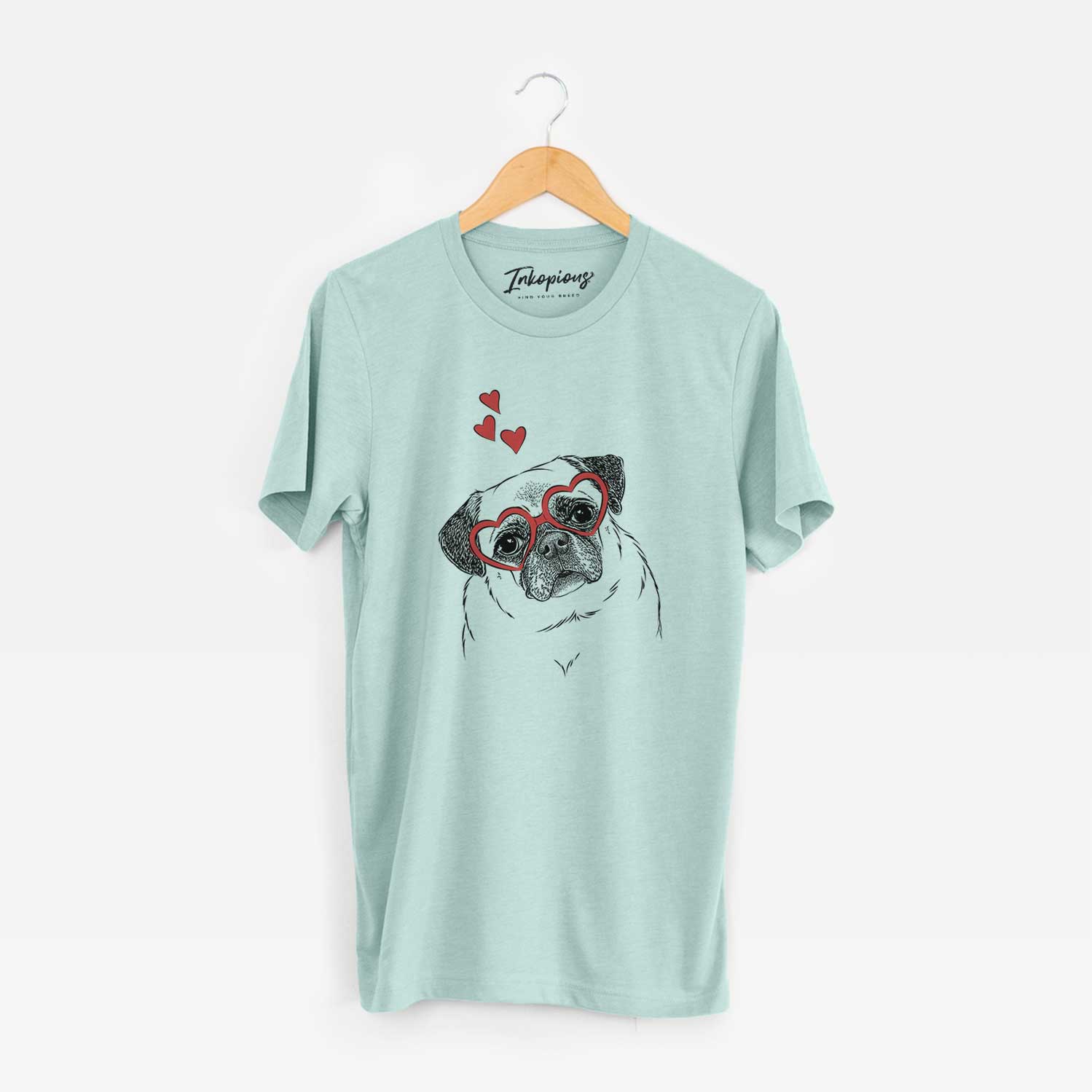 Hand-drawn sketch of Zoey the Pug wearing heart-shaped glasses on a Heather Sage Unisex crewneck