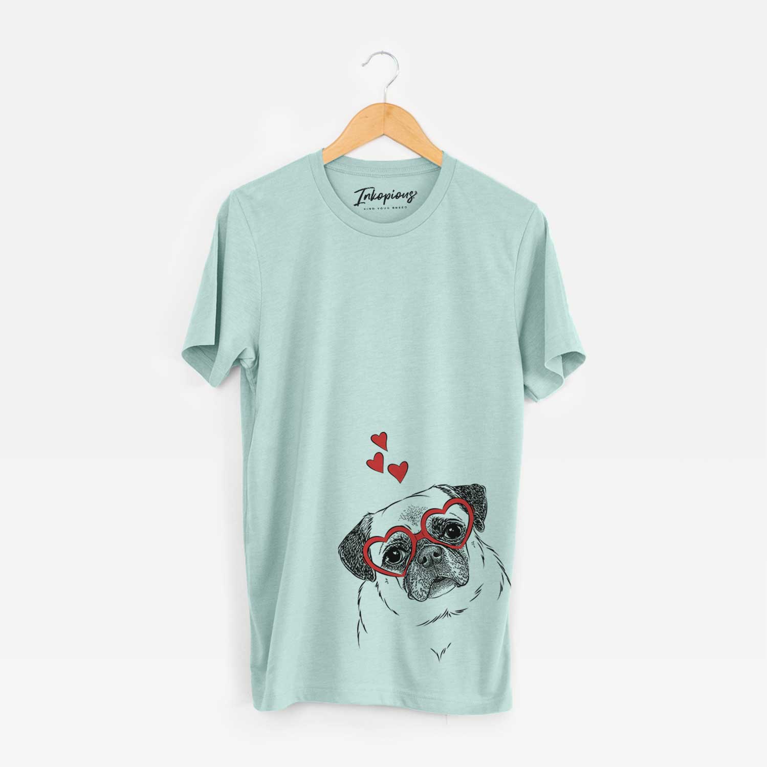 Hand-drawn sketch of Zoey the Pug wearing heart-shaped glasses on a Heather Sage Unisex crewneck