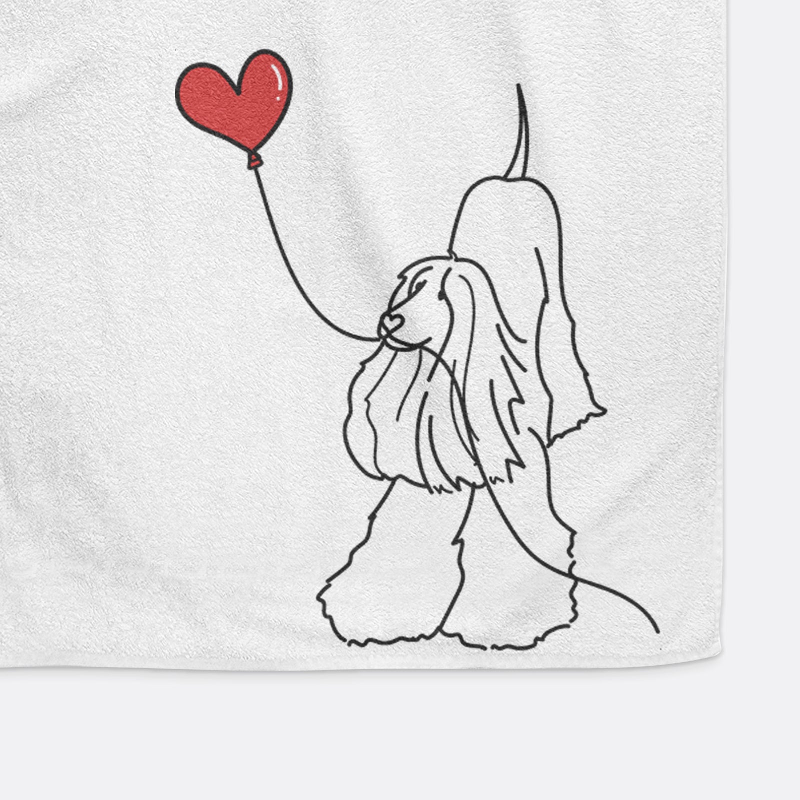 Minimalist line drawing of an Afghan Hound Heart String holding a heart balloon on a decorative hand towel