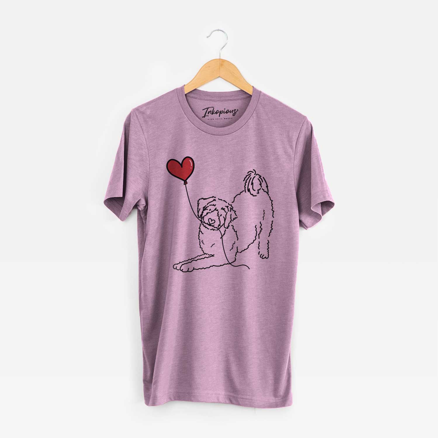 Minimalist line drawing of an Aussiedoodle Heart String holding a heart balloon on an Orchid Unisex crewneck