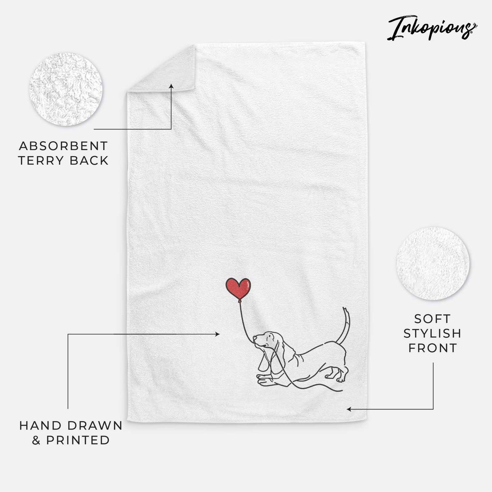 Minimalist line drawing of a Basset Hound Heart String holding a heart balloon on a decorative hand towel