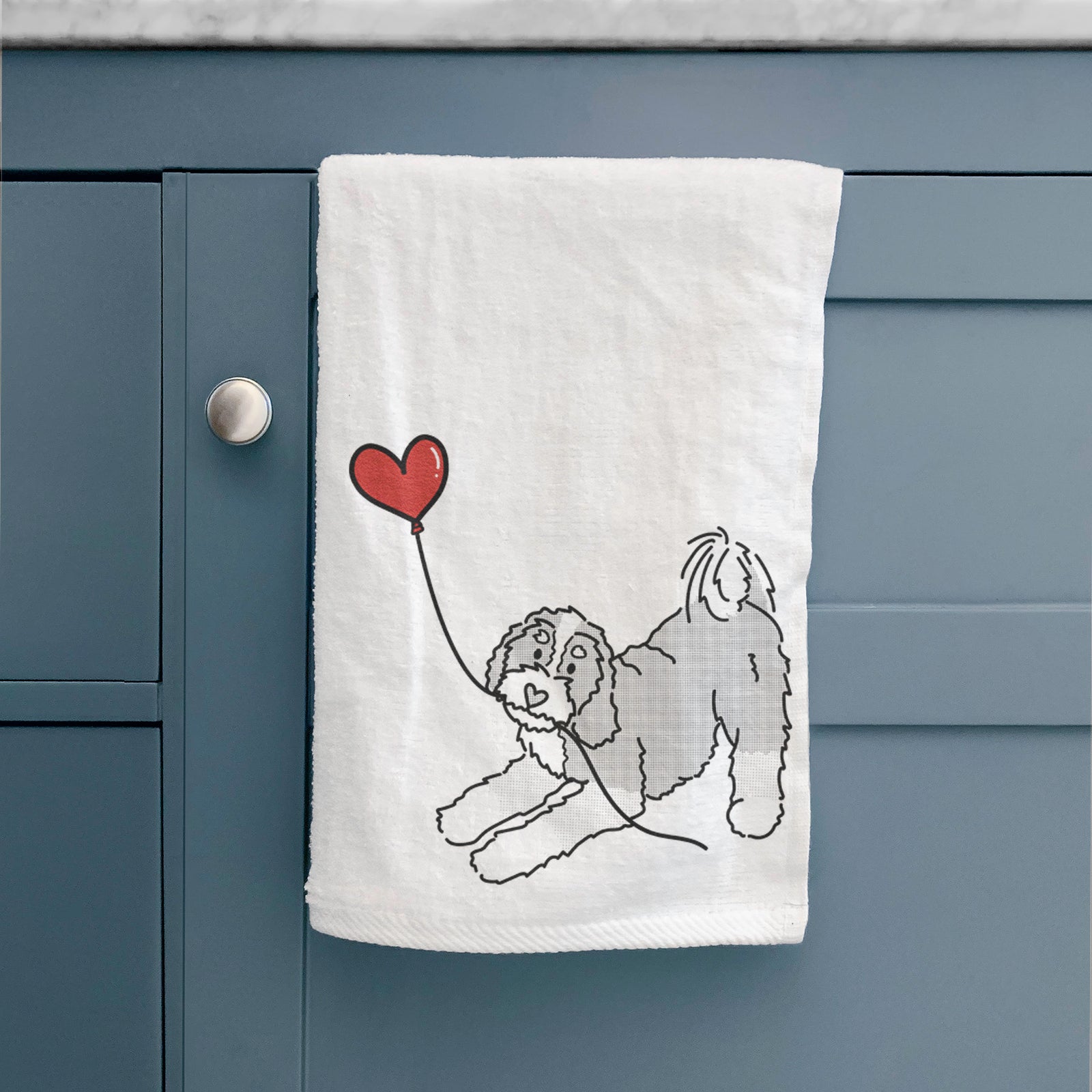 Minimalist line drawing of a Bernedoodle Heart String holding a heart balloon on a decorative hand towel