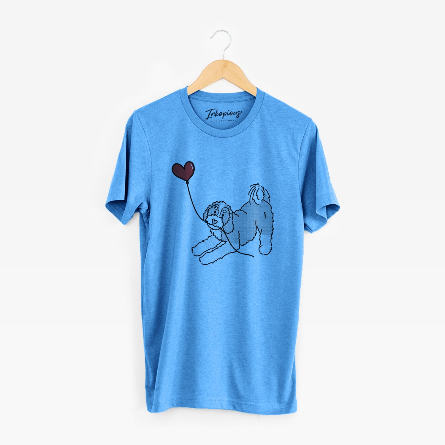 Minimalist line drawing of a Bernedoodle Heart String holding a heart balloon on a Blue Unisex crewneck