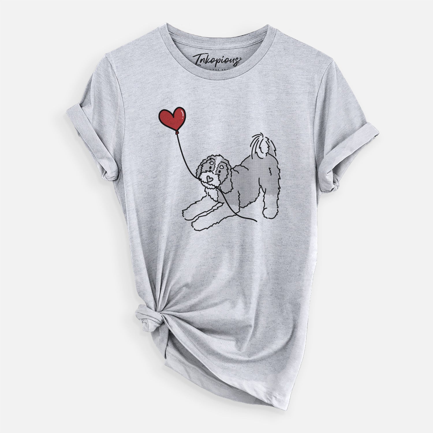 Minimalist line drawing of a Bernedoodle Heart String holding a heart balloon on a Grey Unisex crewneck