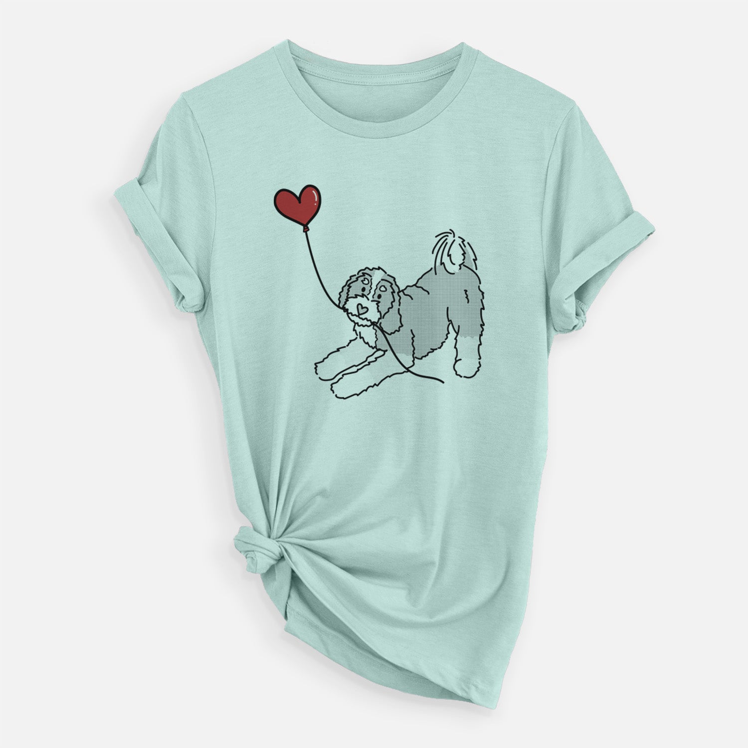 Minimalist line drawing of a Bernedoodle Heart String holding a heart balloon on a Heather Sage Unisex crewneck