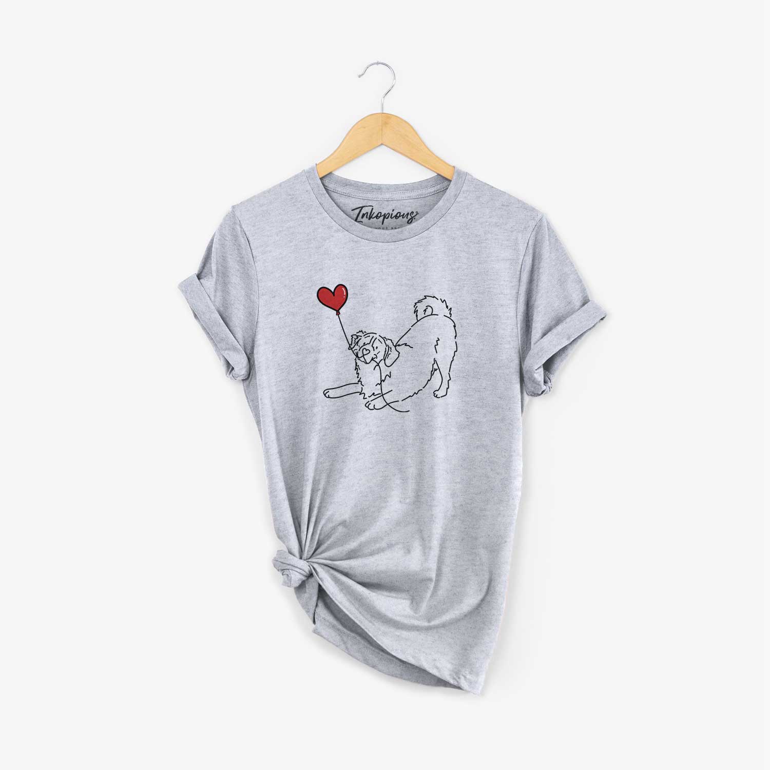 Minimalist line drawing of a Bernese Mountain Dog Heart String holding a heart balloon on a Grey Unisex crewneck