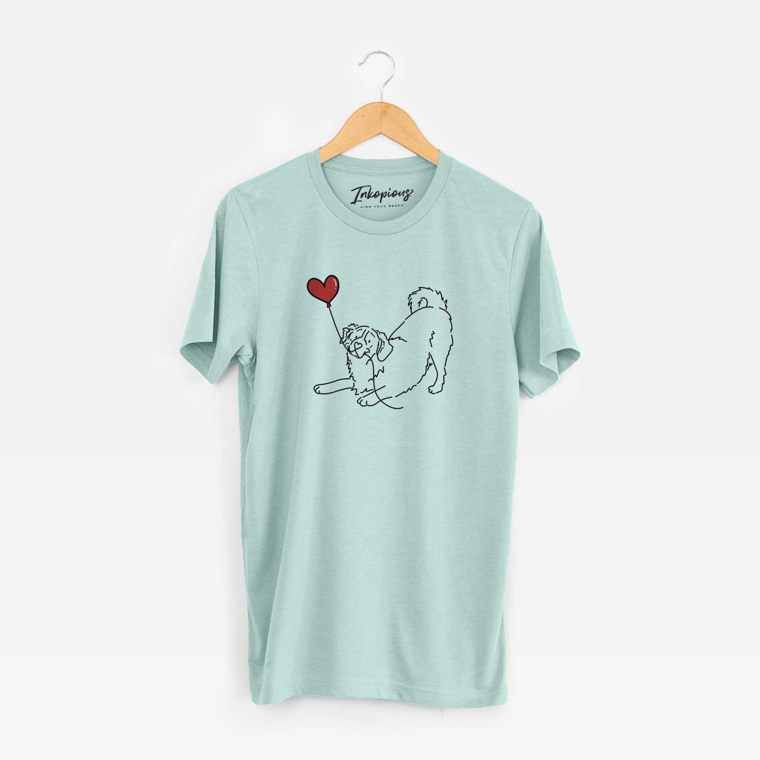 Minimalist line drawing of a Bernese Mountain Dog Heart String holding a heart balloon on a Heather Sage Unisex crewneck