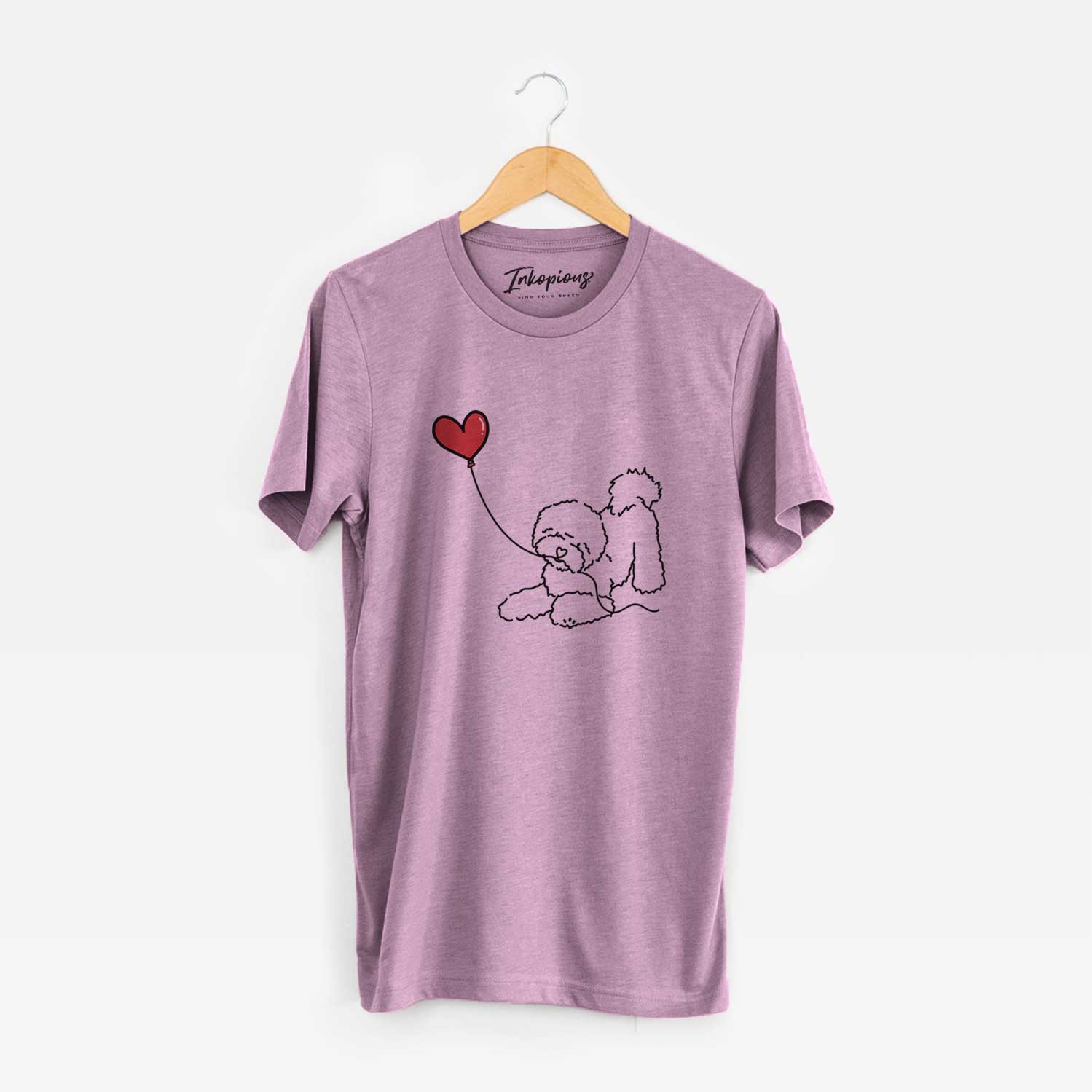 Minimalist line drawing of a Bichon Frise Heart String holding a heart balloon on an Orchid Unisex crewneck