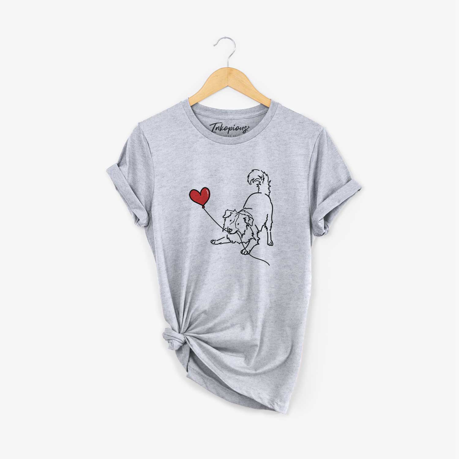 Minimalist line drawing of a Border Collie Heart String holding a heart balloon on a Grey Unisex crewneck
