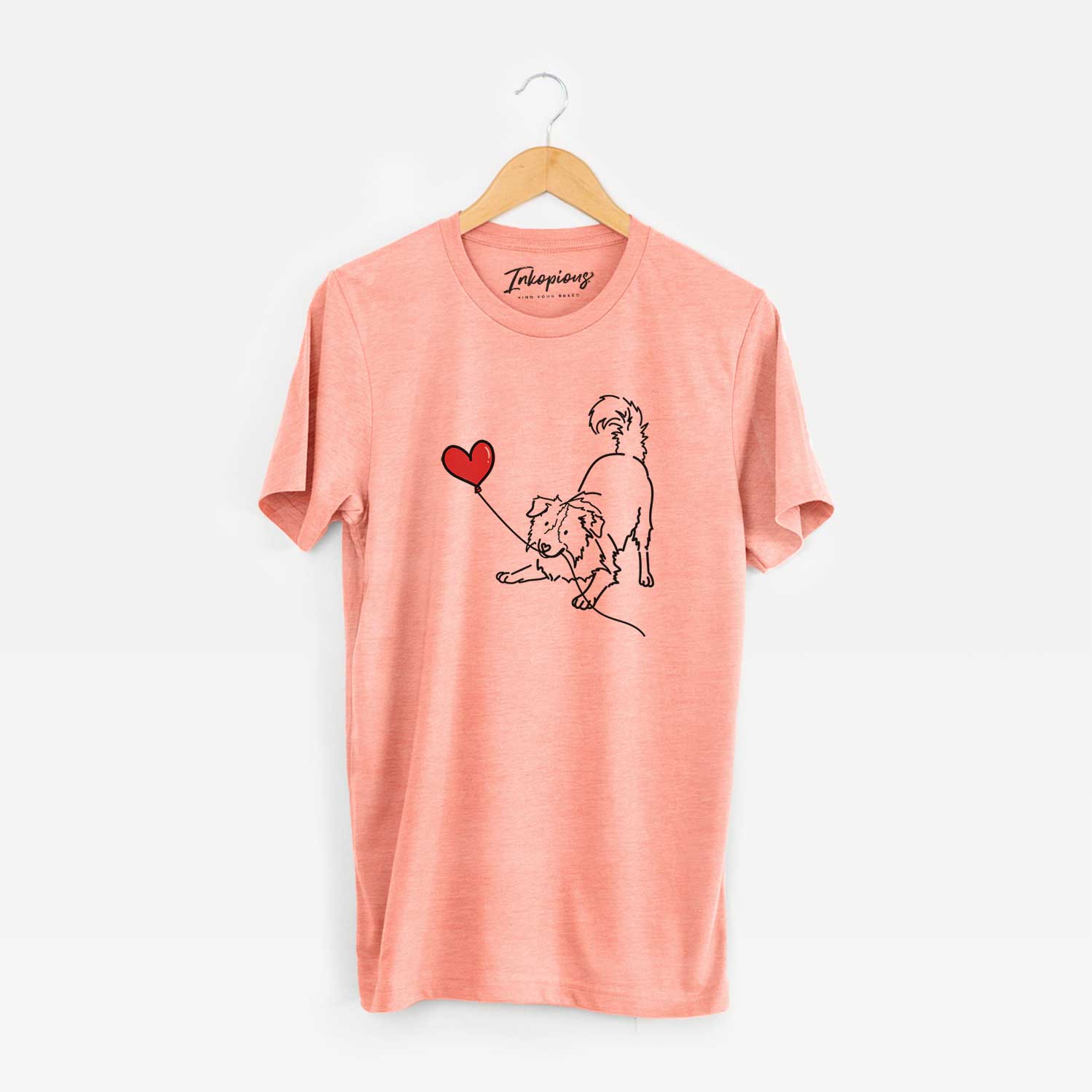 Minimalist line drawing of a Border Collie Heart String holding a heart balloon on a Sunset Unisex crewneck