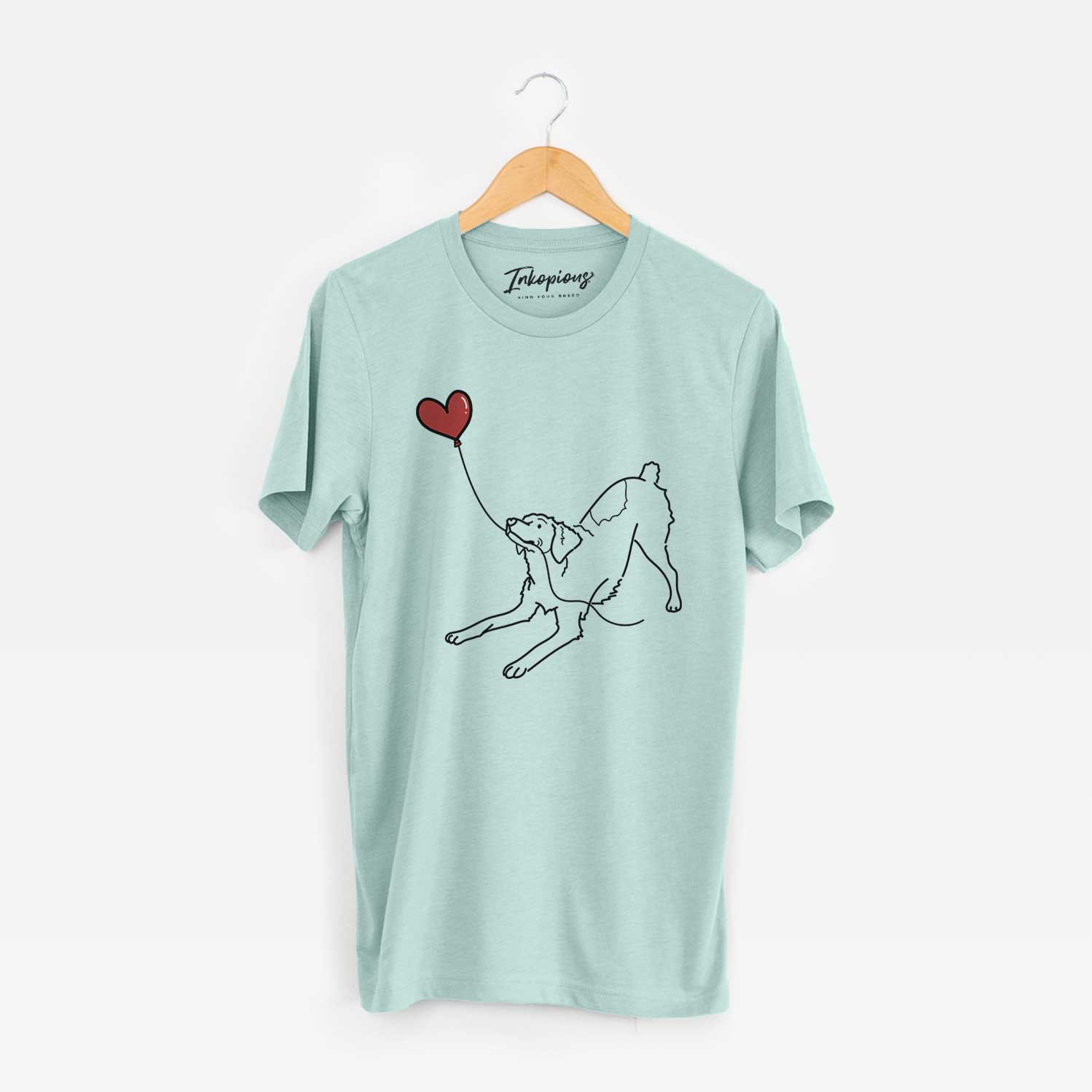 Minimalist line drawing of a Brittany Spaniel Heart String holding a heart balloon on a Heather Sage Unisex crewneck