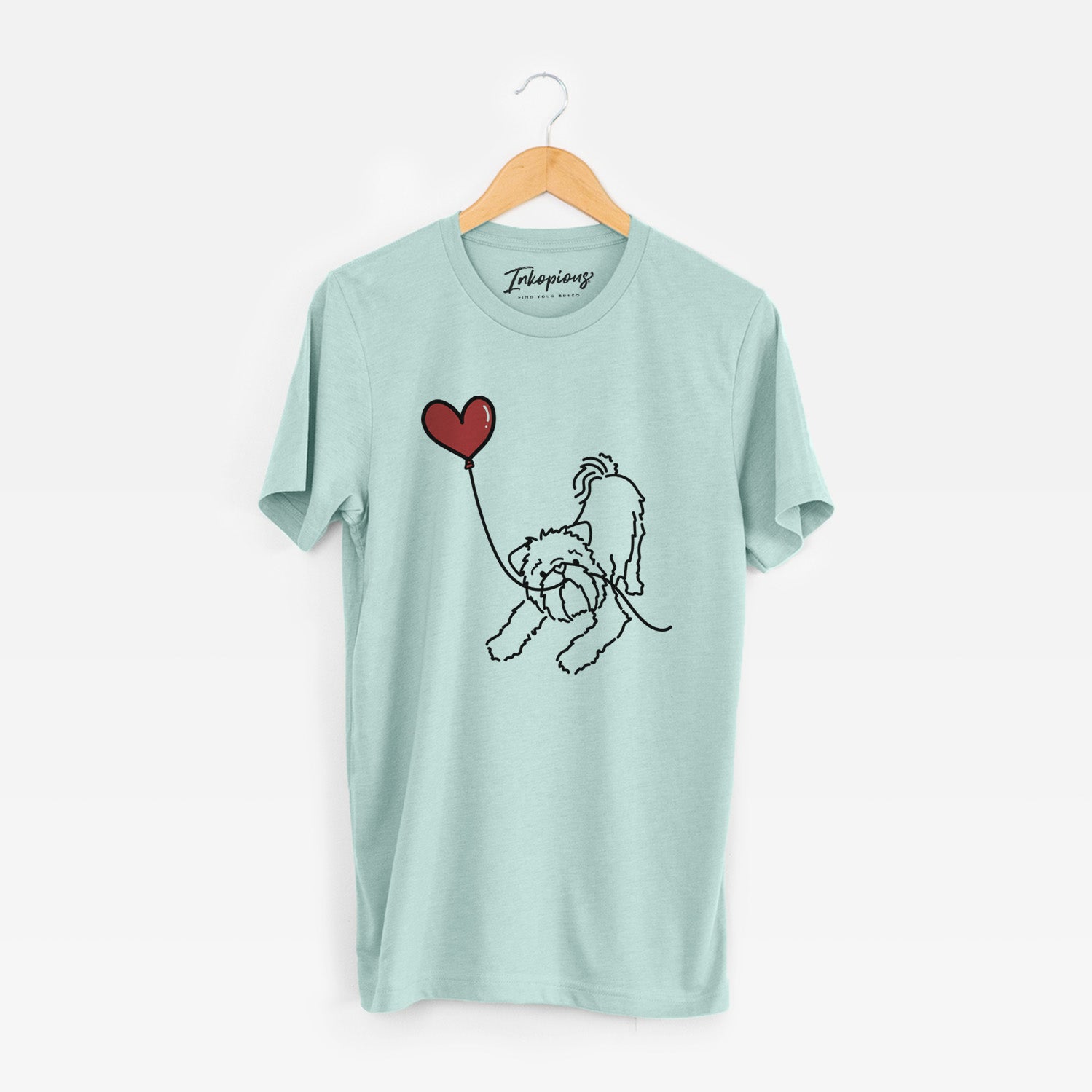 Minimalist line drawing of a Brussels Griffon Heart String holding a heart balloon on a Heather Sage Unisex crewneck