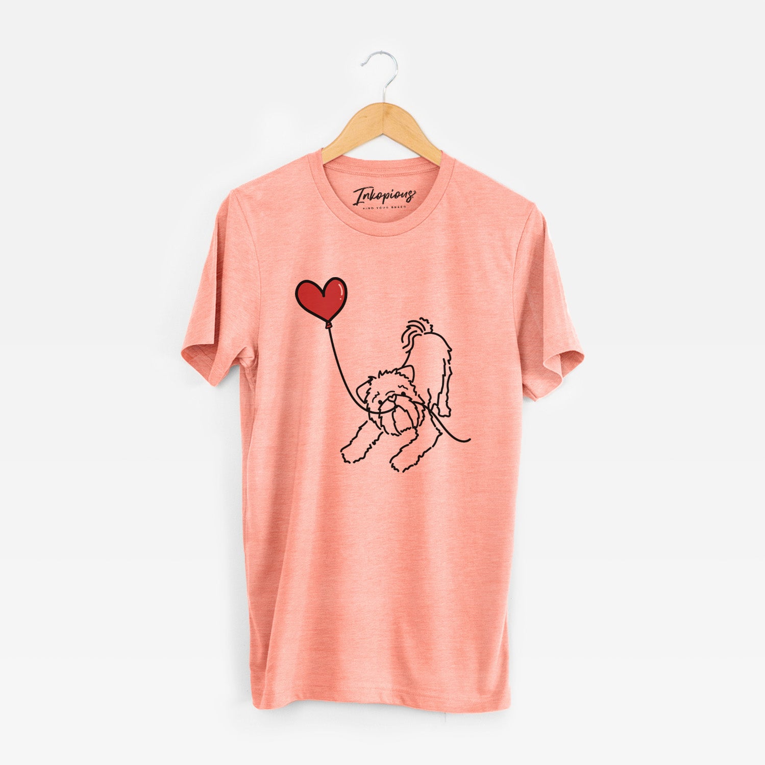 Minimalist line drawing of a Brussels Griffon Heart String holding a heart balloon on a Sunset Unisex crewneck