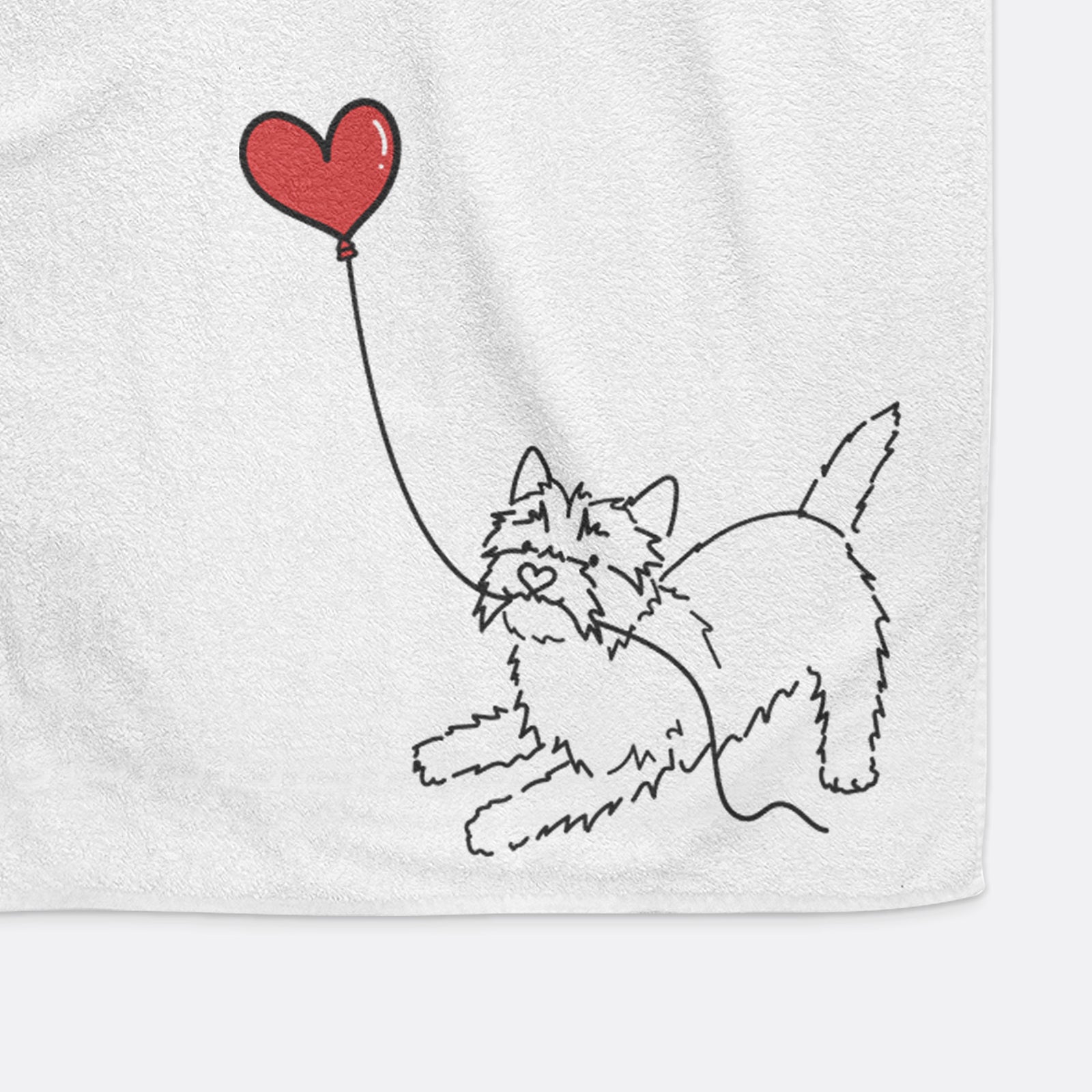 Minimalist line drawing of a Cairn Terrier Heart String holding a heart balloon on a decorative hand towel