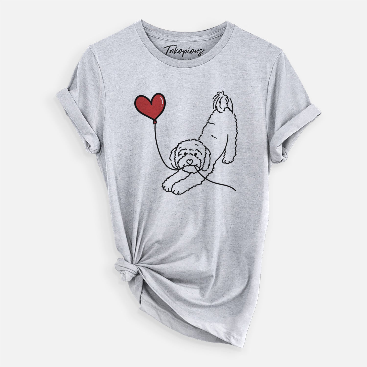 Minimalist line drawing of a Cavapoo Heart String holding a heart balloon on a Grey Unisex crewneck