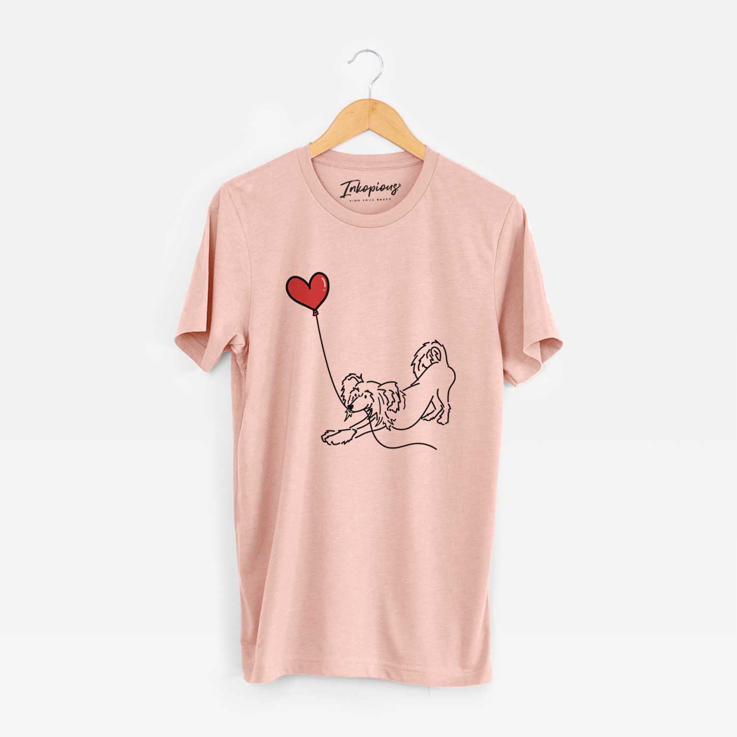 Minimalist line drawing of a Chinese Crested Heart String holding a heart balloon on a Peach Unisex crewneck