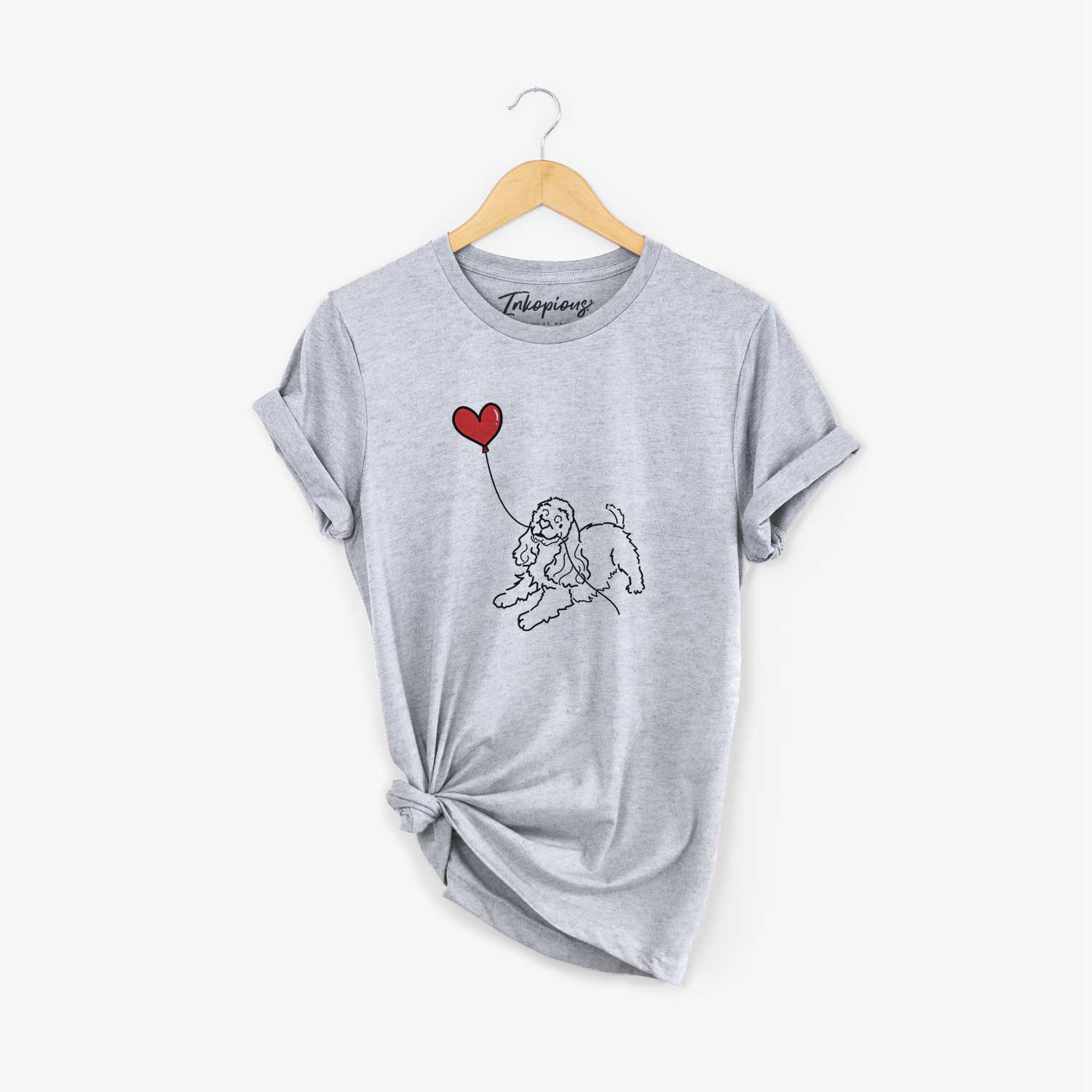 Minimalist line drawing of a Cocker Spaniel Heart String holding a heart balloon on a Grey Unisex crewneck