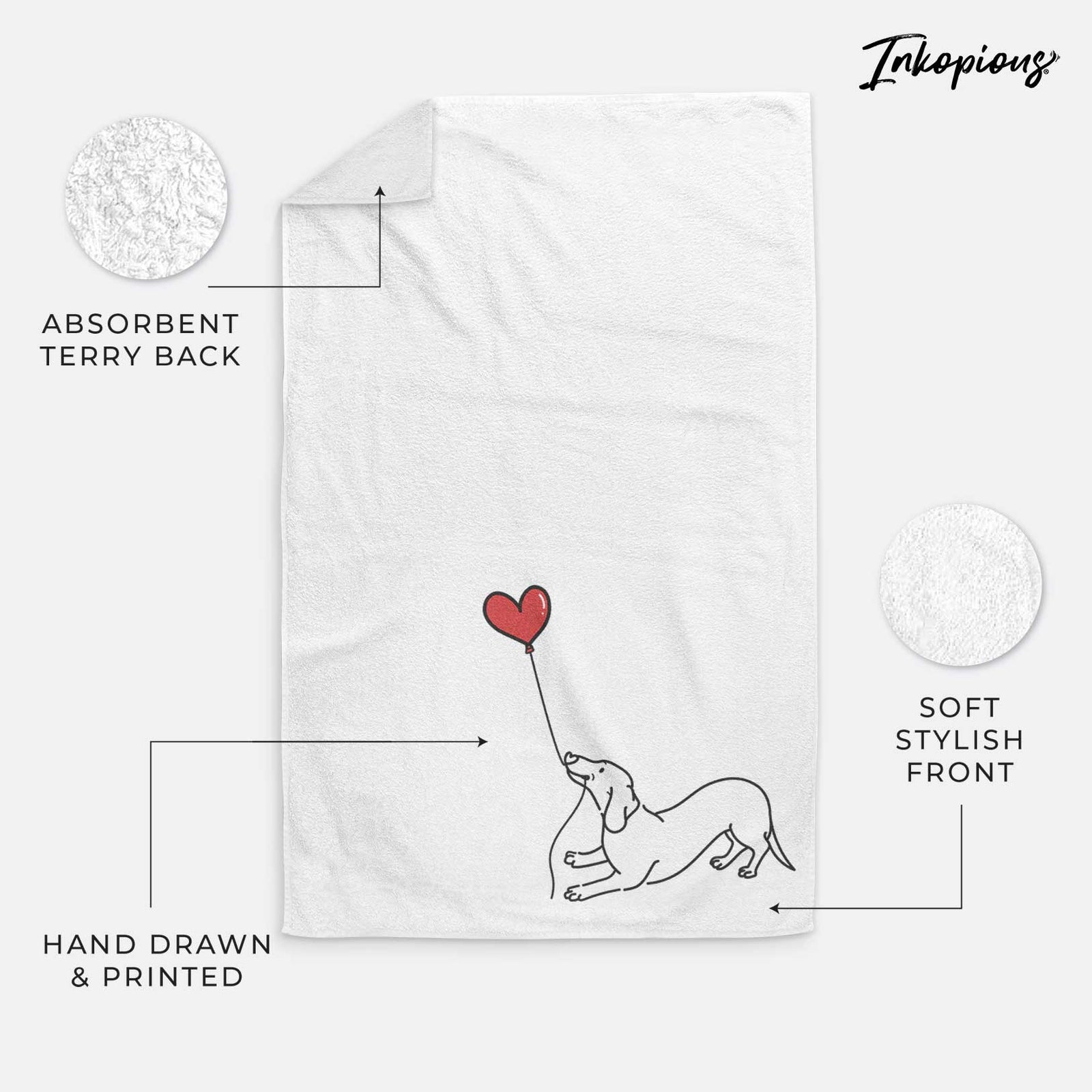Minimalist line drawing of a Dachshund Heart String holding a heart balloon on a decorative hand towel