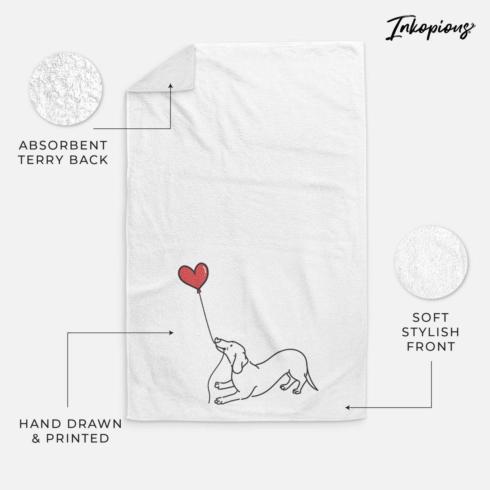 Minimalist line drawing of a Dachshund Heart String holding a heart balloon on a decorative hand towel