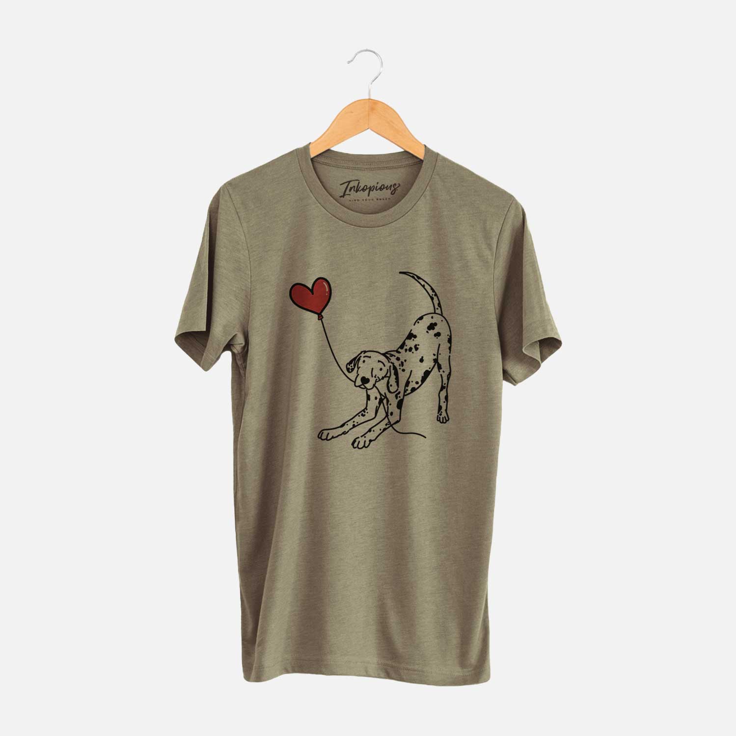 Minimalist line drawing of a Dalmatian Heart String holding a heart balloon on an Olive Unisex crewneck
