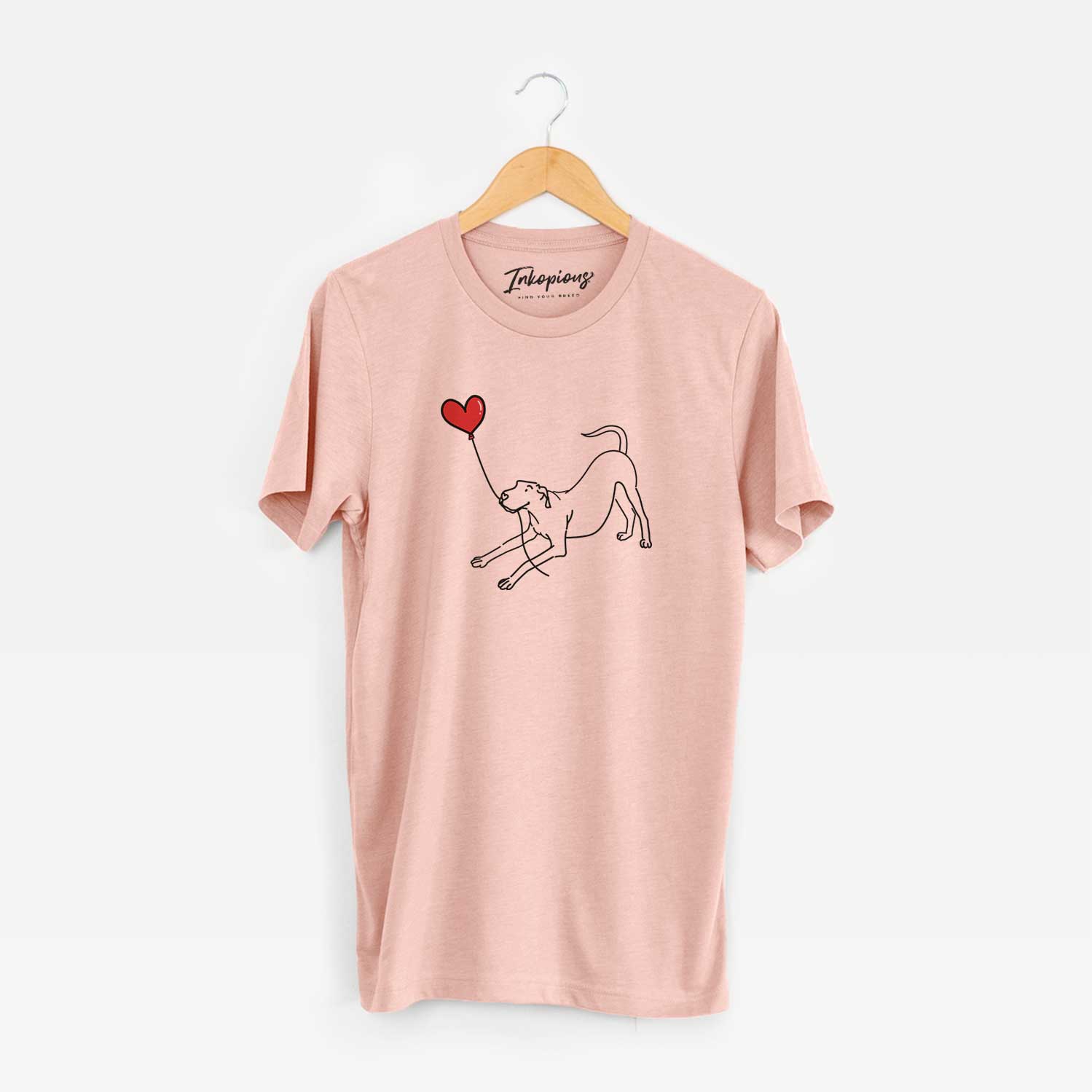 Minimalist line drawing of a Great Dane Heart String holding a heart balloon on a Peach Unisex crewneck