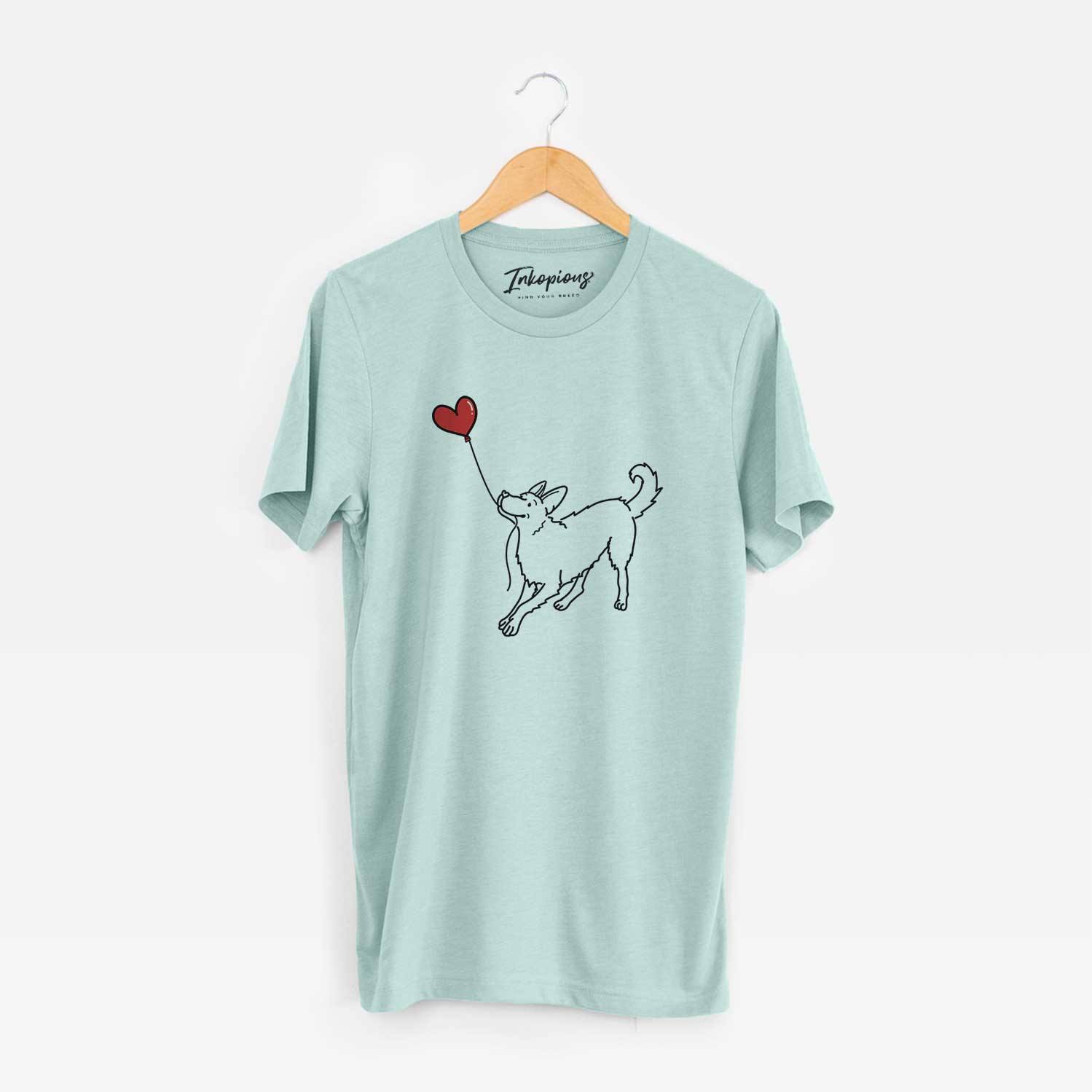 Minimalist line drawing of a German Shepherd Heart String holding a heart balloon on a Heather Sage Unisex crewneck