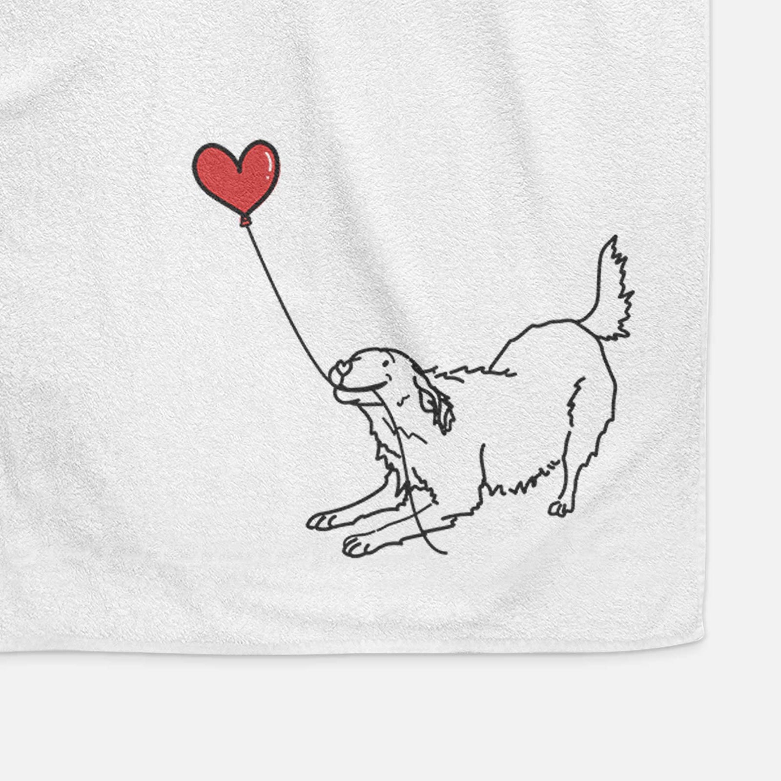 Minimalist line drawing of a Golden Retriever Heart String holding a heart balloon on a decorative hand towel