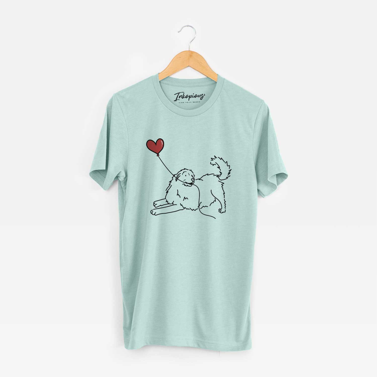 Minimalist line drawing of a Great Pyrenees Heart String holding a heart balloon on a Heather Sage Unisex crewneck