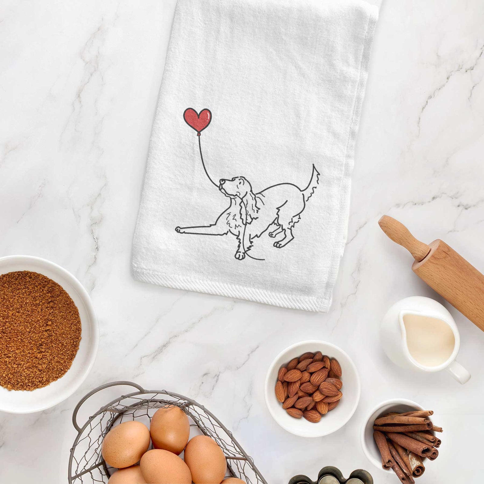 Minimalist line drawing of an Irish Setter Heart String holding a heart balloon on a decorative hand towel
