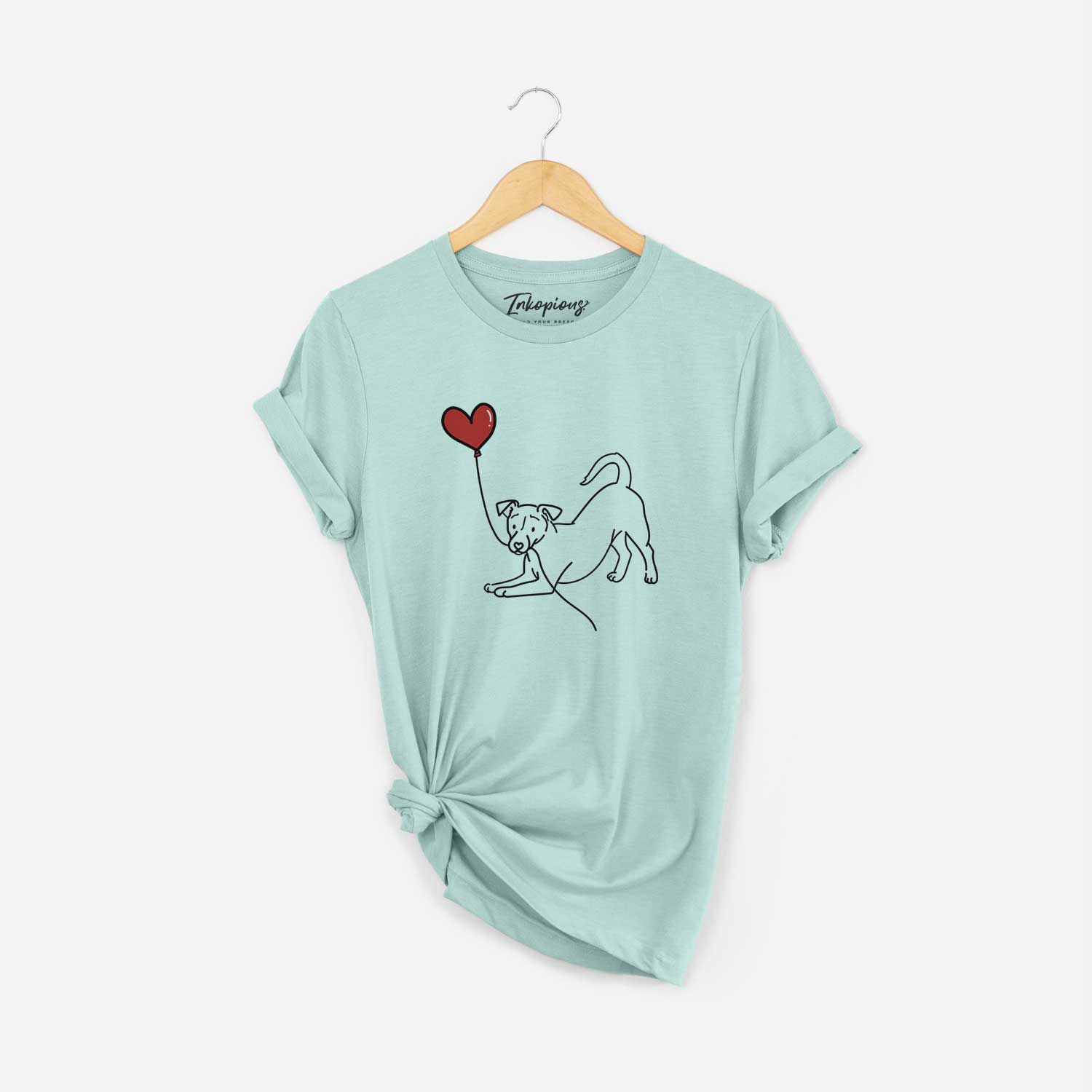 Minimalist line drawing of a Jack Russell Terrier Heart String holding a heart balloon on a Heather Sage Unisex crewneck