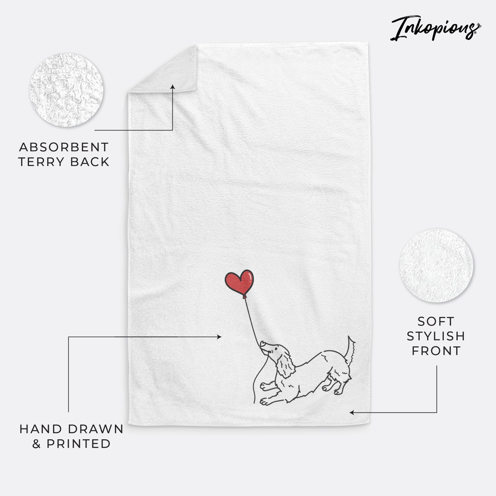 Minimalist line drawing of a Long Haired Dachshund Heart String holding a heart balloon on a decorative hand towel