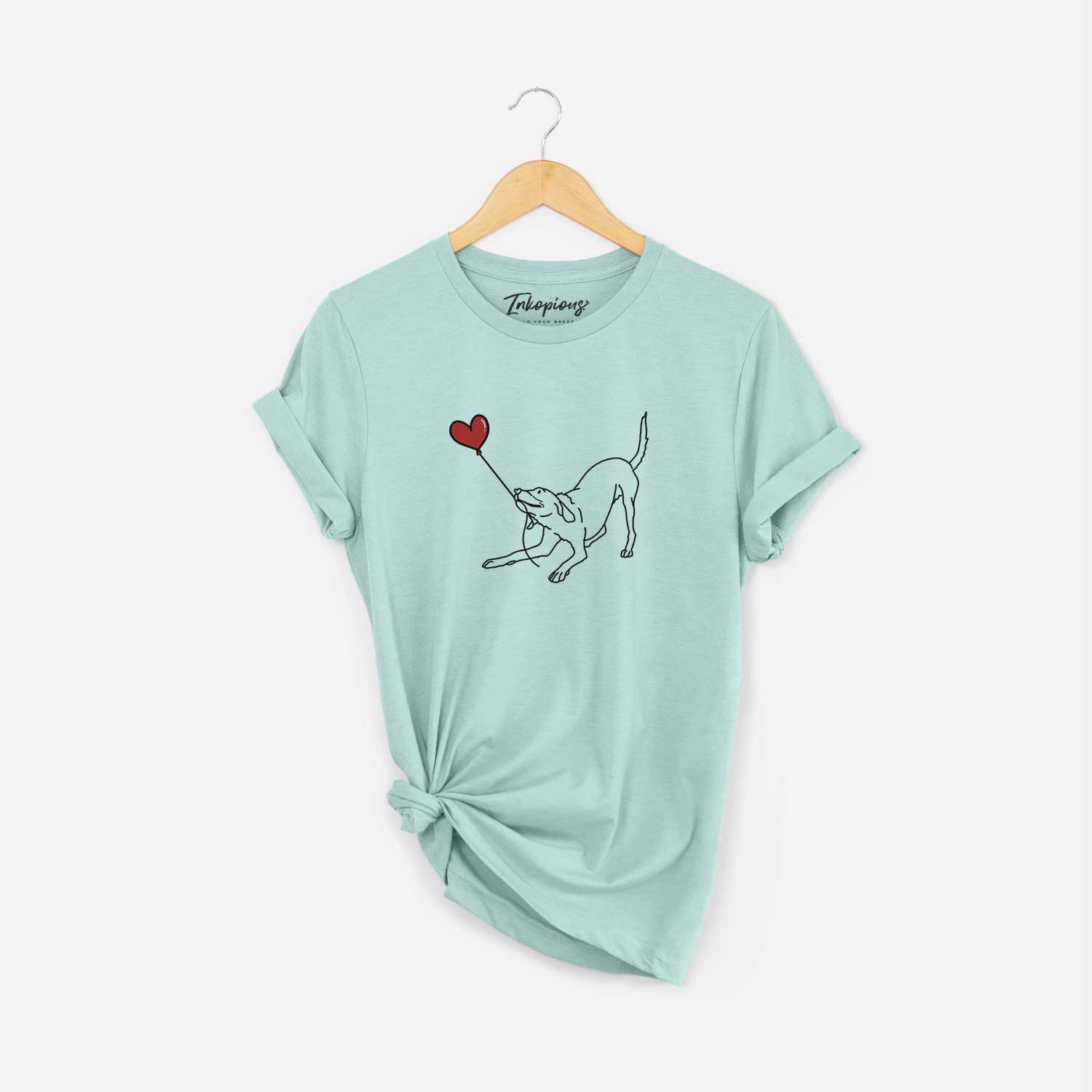 Minimalist line drawing of a Labrador Retriever Heart String holding a heart balloon on a Heather Sage Unisex crewneck