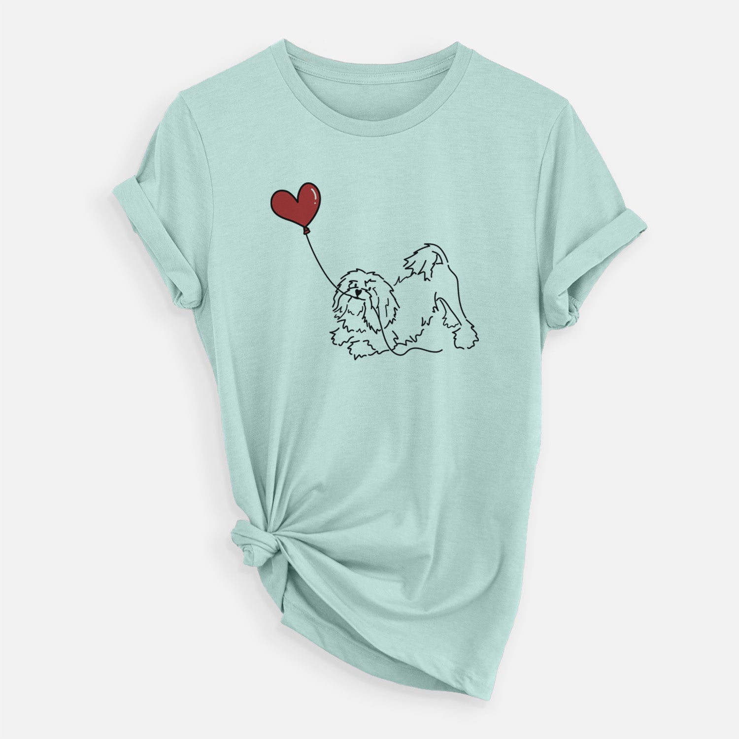 Minimalist line drawing of a Lowchen Heart String holding a heart balloon on a Heather Sage Unisex crewneck