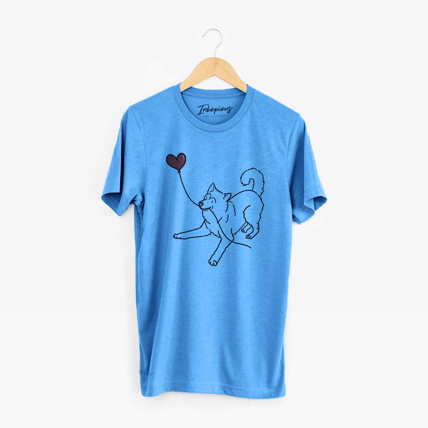 Minimalist line drawing of an Alaskan Malamute Heart String holding a heart balloon on a Blue Unisex crewneck