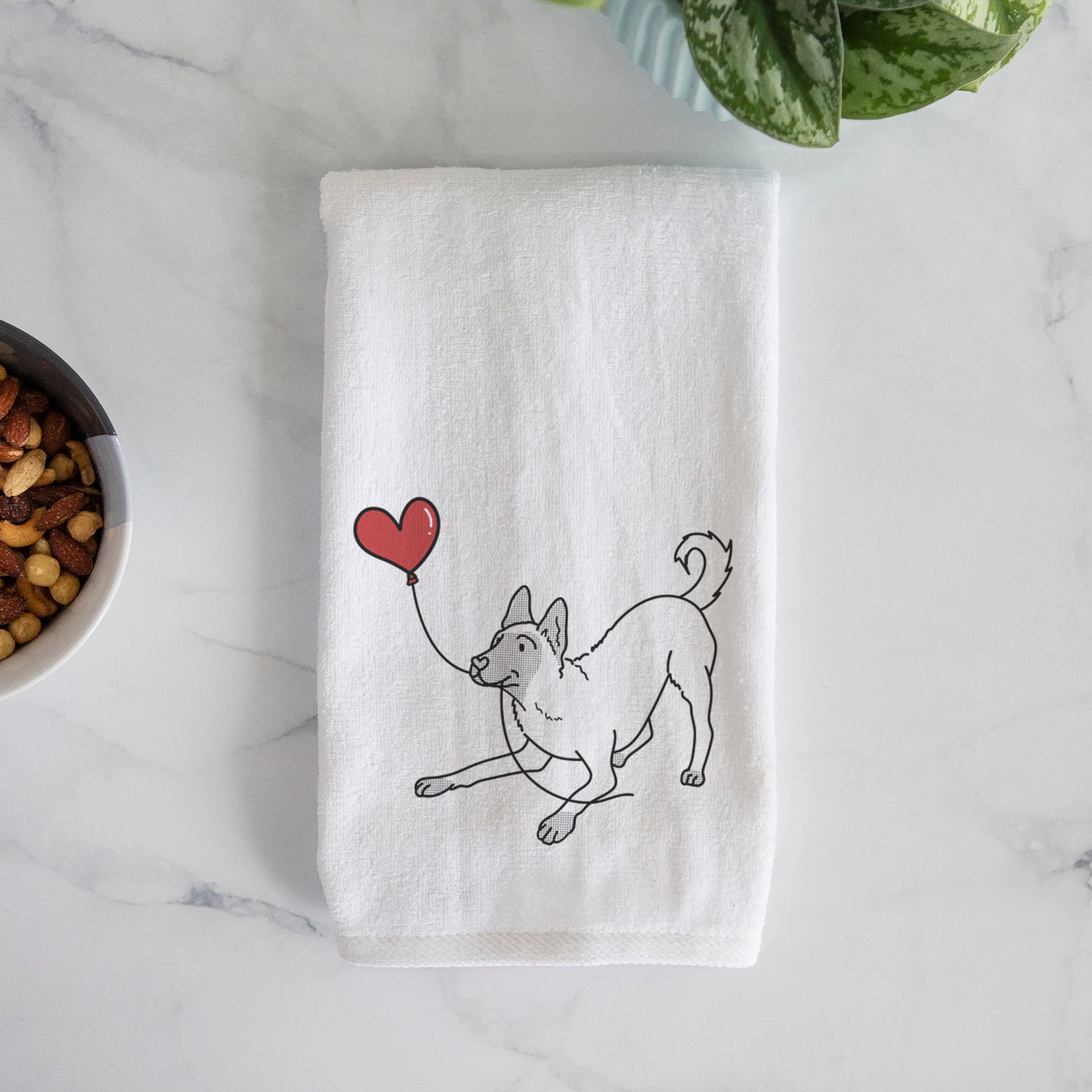 Minimalist line drawing of a Belgian Malinois Heart String holding a heart balloon on a decorative hand towel