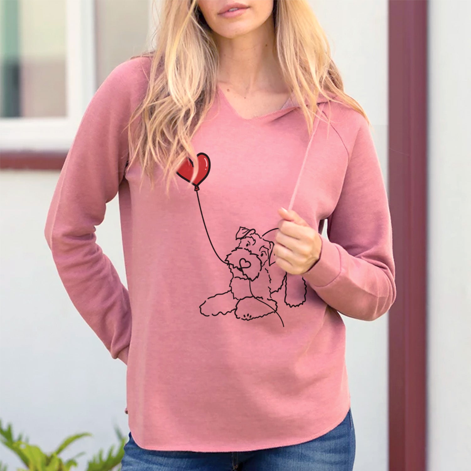 Minimalist line drawing of a Mini Schnauzer Heart String holding a heart balloon on a Dusty Rose Cali Wave Hooded Sweatshirt, lifestyle photo