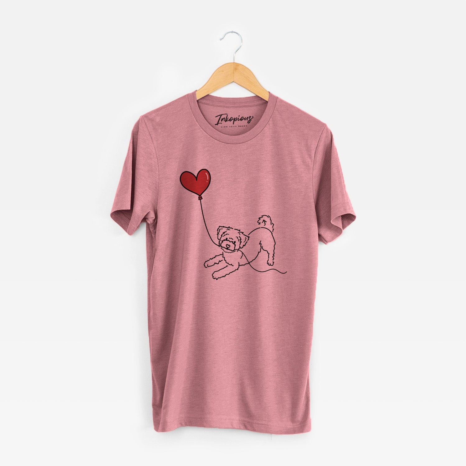 Minimalist line drawing of a Morkie Heart String holding a heart balloon on a Mauve Unisex crewneck