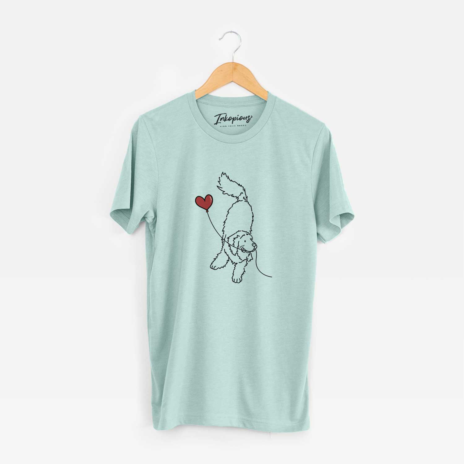 Minimalist line drawing of a Newfoundland Heart String holding a heart balloon on a Heather Sage Unisex crewneck