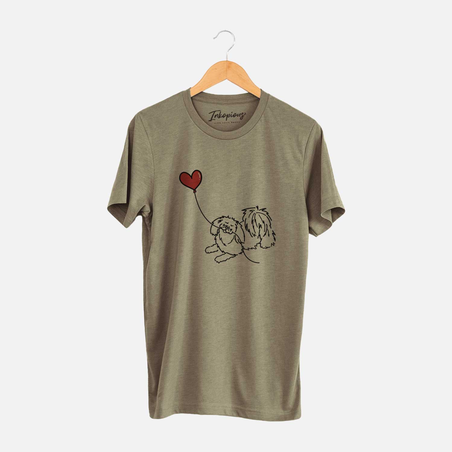 Minimalist line drawing of a Pekingese Heart String holding a heart balloon on an Olive Unisex crewneck