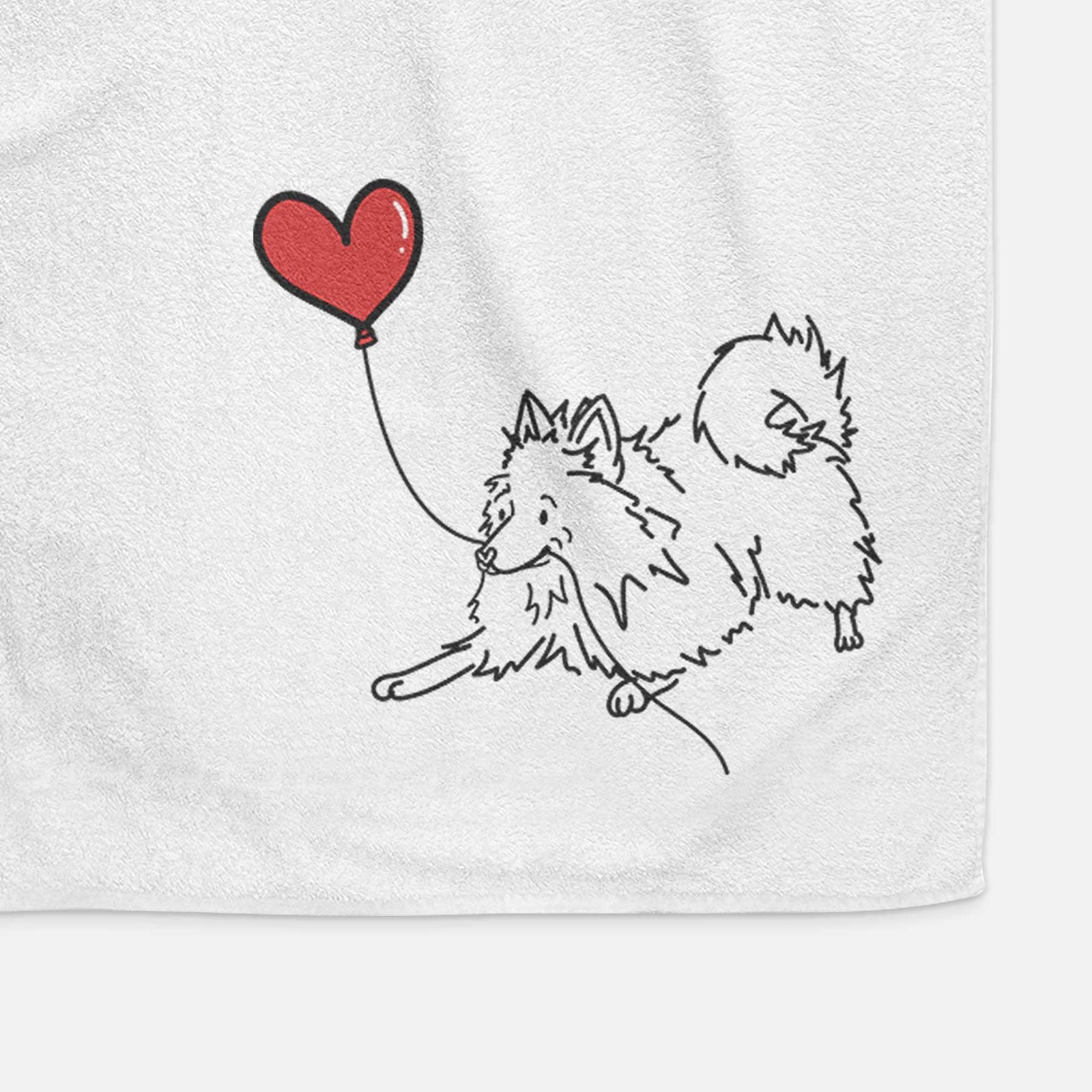 Minimalist line drawing of a Pomeranian Heart String holding a heart balloon on a decorative hand towel