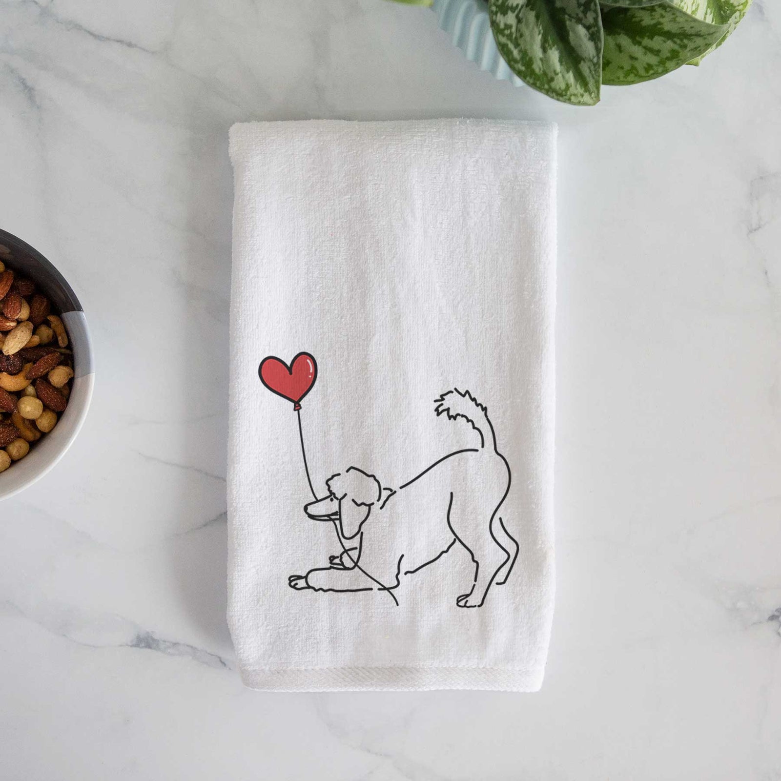 Minimalist line drawing of a Standard Poodle Heart String holding a heart balloon on a decorative hand towel